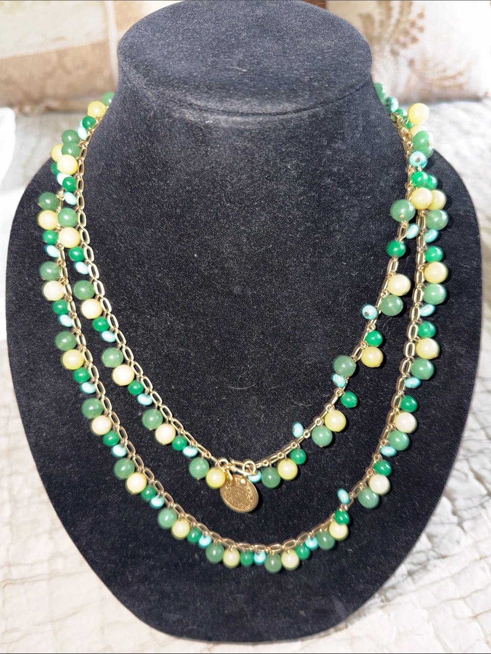 Extra long beaded necklace semi precious beads on gold tone chain coin clasp